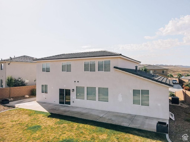 583 N Staci Dr, Hurricane, UT 84737 - back of property featuring a patio area, stucco siding, a tiled roof, and central air condition unit