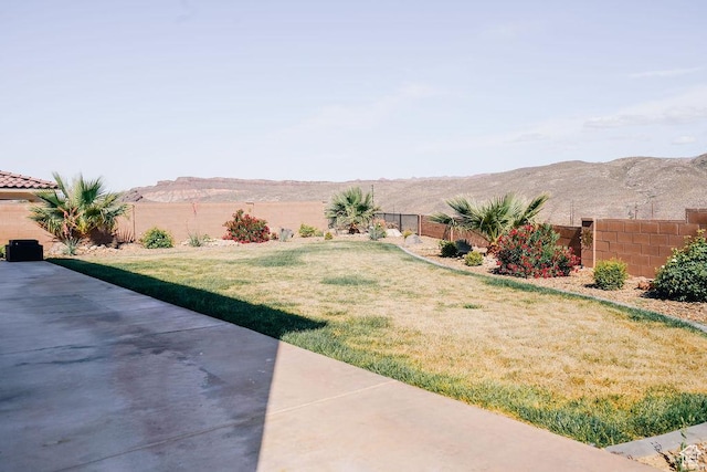 583 N Staci Dr, Hurricane, UT 84737 - view of yard with a mountain view and a patio