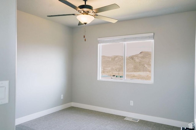 583 N Staci Dr, Hurricane, UT 84737 - empty room featuring baseboards, ceiling fan, and carpet floors