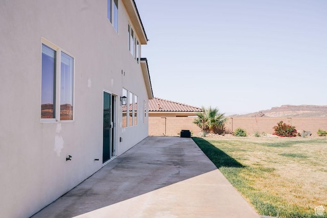 583 N Staci Dr, Hurricane, UT 84737 - view of home's exterior featuring stucco siding, a patio area, and a mountain view