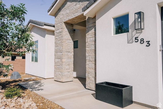 583 N Staci Dr, Hurricane, UT 84737 - entrance to property with stone siding and stucco siding
