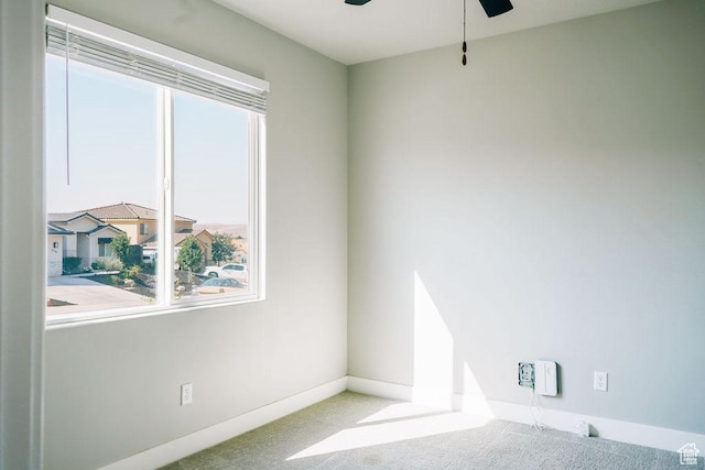 583 N Staci Dr, Hurricane, UT 84737 - carpeted empty room with healthy amount of natural light, a ceiling fan, and baseboards