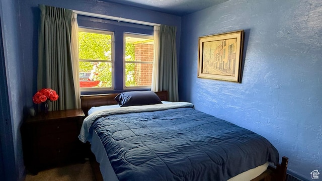 74 W Quayle Ave S, Salt Lake City, UT 84115 - bedroom featuring a textured wall