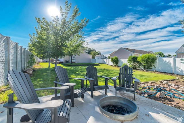 8465 S 1670 W, West Jordan, UT 84088 - view of patio featuring a fire pit and a residential view