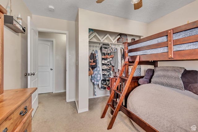 8465 S 1670 W, West Jordan, UT 84088 - bedroom featuring light colored carpet, baseboards, a closet, and a ceiling fan