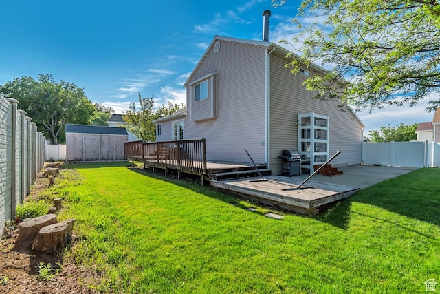 8465 S 1670 W, West Jordan, UT 84088 - rear view of house featuring a wooden deck