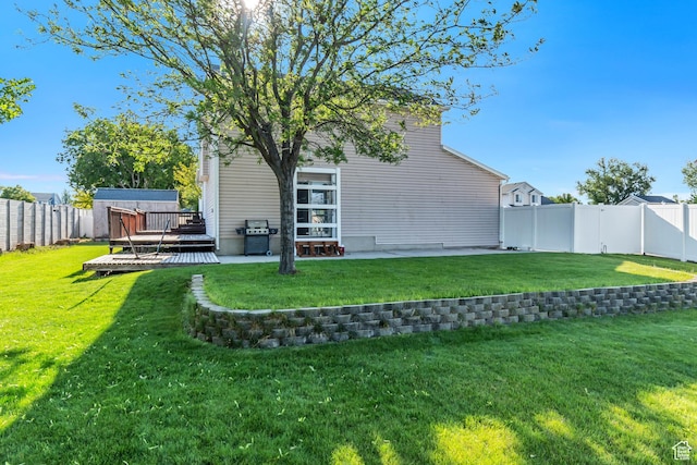 8465 S 1670 W, West Jordan, UT 84088 - back of property featuring a wooden deck