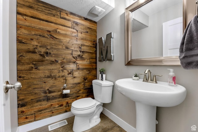 3946 W Birmingham Cir S, Jordan, UT 84009 - bathroom featuring toilet and baseboards