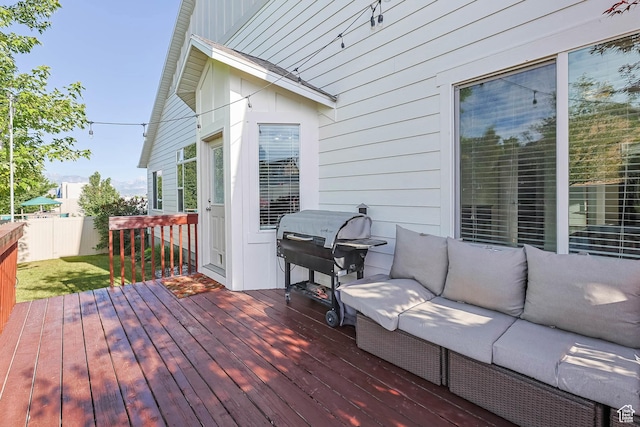 3946 W Birmingham Cir S, Jordan, UT 84009 - wooden deck featuring area for grilling and an outdoor living space