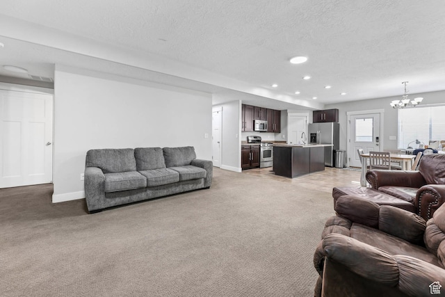 3946 W Birmingham Cir S, Jordan, UT 84009 - living room featuring a chandelier, light carpet, baseboards, a textured ceiling, and recessed lighting