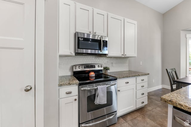 3946 W Birmingham Cir S, Jordan, UT 84009 - kitchen featuring stainless steel appliances, tasteful backsplash, light stone countertops, and white cabinets