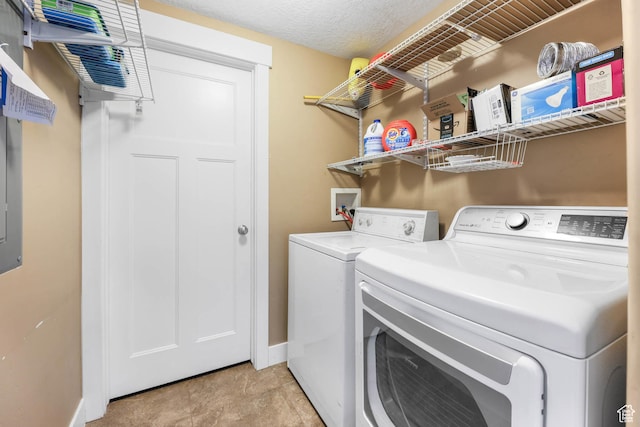 3946 W Birmingham Cir S, Jordan, UT 84009 - laundry room with washer and clothes dryer and baseboards