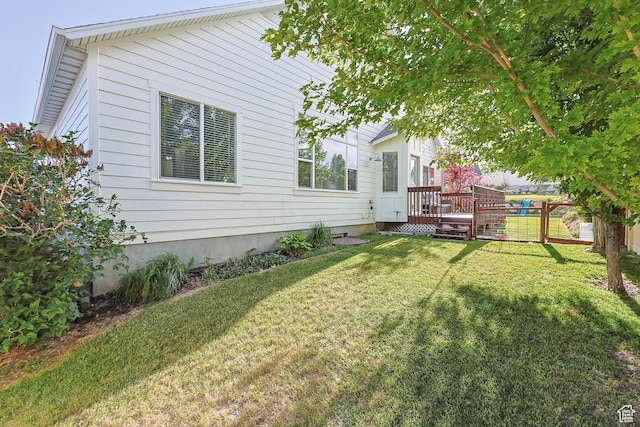 3946 W Birmingham Cir S, Jordan, UT 84009 - view of yard featuring a deck