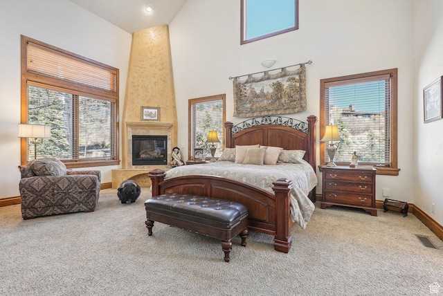 3239 Mountain Top Ln, Park City, UT 84060 - carpeted bedroom with a towering ceiling, baseboards, and a premium fireplace
