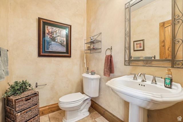 3239 Mountain Top Ln, Park City, UT 84060 - bathroom featuring toilet, baseboards, tile patterned floors, and a sink
