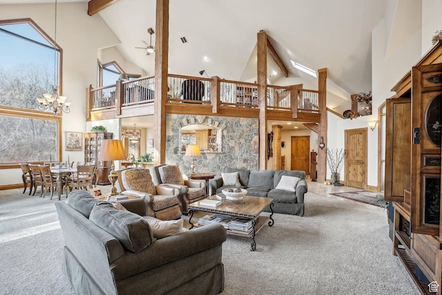 3239 Mountain Top Ln, Park City, UT 84060 - carpeted living room with high vaulted ceiling, beam ceiling, ceiling fan, a chandelier, and baseboards