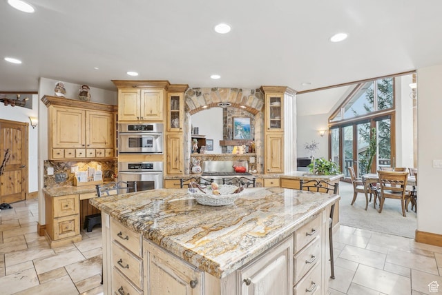 3239 Mountain Top Ln, Park City, UT 84060 - kitchen with recessed lighting, light stone counters, glass insert cabinets, and tasteful backsplash