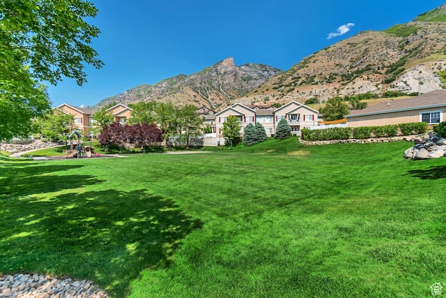 1043 Canyon Meadow Dr Unit 2, Provo, UT 84606 - view of grassy yard featuring a playground and a mountain view