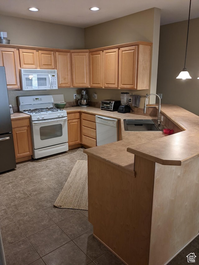 1043 Canyon Meadow Dr Unit 2, Provo, UT 84606 - kitchen with white appliances, light brown cabinets, a peninsula, light countertops, and a sink