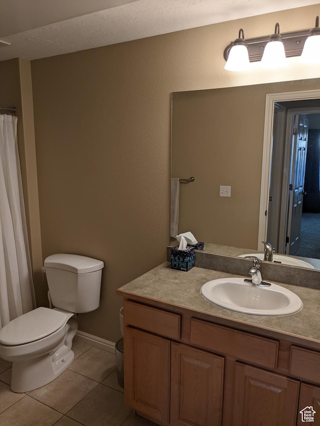 1043 Canyon Meadow Dr Unit 2, Provo, UT 84606 - bathroom with toilet, vanity, and tile patterned flooring