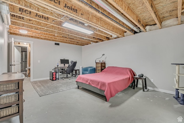 8831 W Digger Ln S, Magna, UT 84044 - bedroom with concrete flooring, an office area, and baseboards