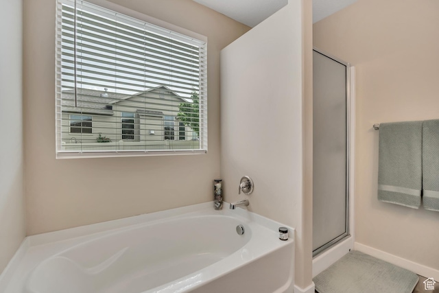 8831 W Digger Ln S, Magna, UT 84044 - full bathroom with a garden tub and a stall shower