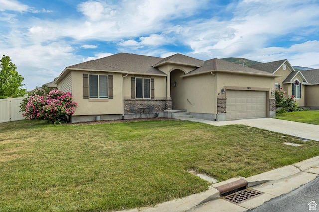 8831 W Digger Ln S, Magna, UT 84044 - view of front of house with stucco siding, a garage, driveway, and a shingled roof