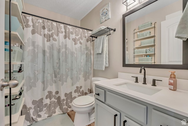 8831 W Digger Ln S, Magna, UT 84044 - bathroom with toilet, vanity, wood finished floors, curtained shower, and a textured ceiling