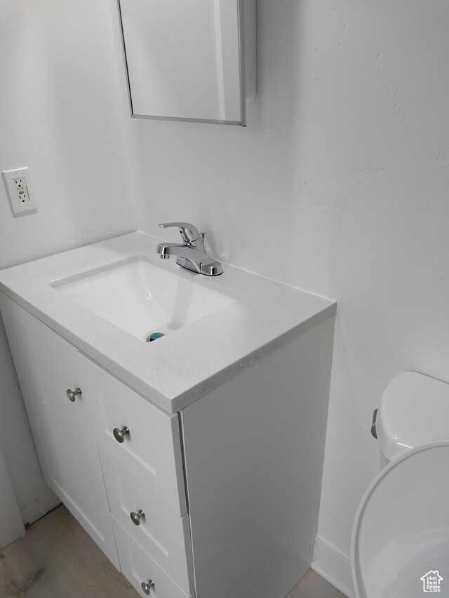 138 W 8865 S Unit 16, Sandy, UT 84070 - half bathroom featuring vanity and toilet