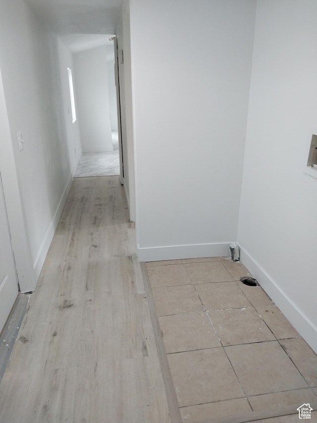 138 W 8865 S Unit 16, Sandy, UT 84070 - corridor with baseboards and wood finished floors
