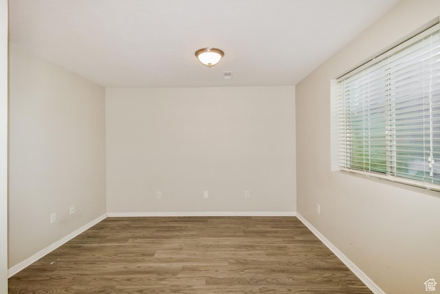 2802 W 4375 S, Roy, UT 84067 - spare room featuring wood finished floors and baseboards