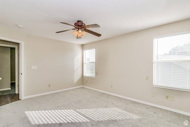2802 W 4375 S, Roy, UT 84067 - unfurnished room with light carpet, ceiling fan, and baseboards