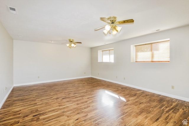 2802 W 4375 S, Roy, UT 84067 - spare room with ceiling fan, wood finished floors, and baseboards