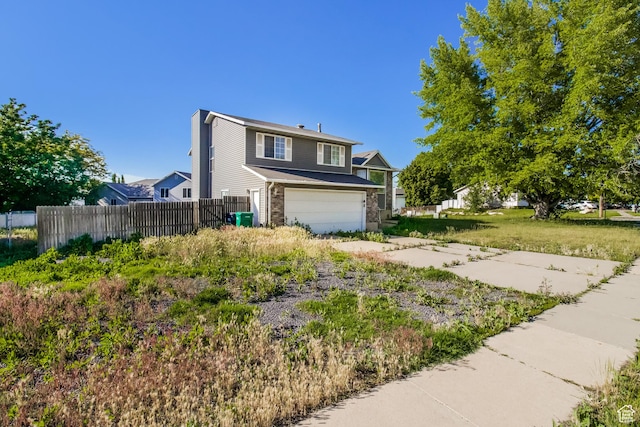 2802 W 4375 S, Roy, UT 84067 - view of front of home with an attached garage and driveway