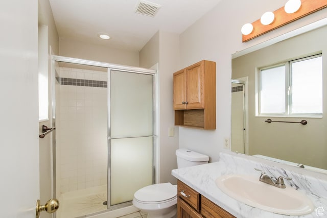 2802 W 4375 S, Roy, UT 84067 - bathroom featuring toilet, vanity, and a shower stall