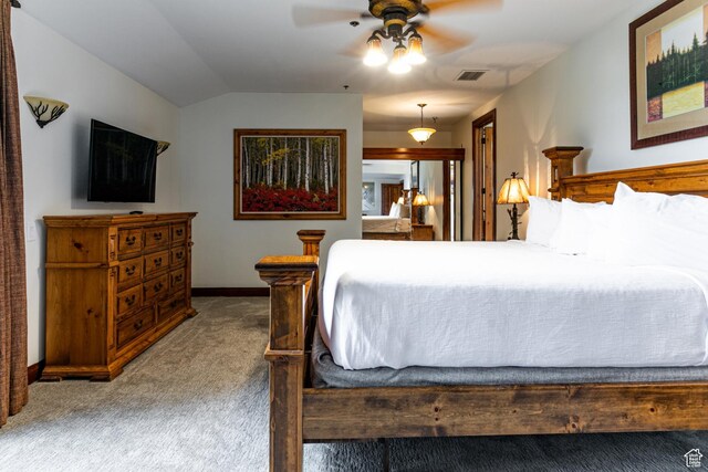 1485 Empire Ave Unit 511, Park City, UT 84060 - carpeted bedroom with vaulted ceiling, baseboards, and a ceiling fan