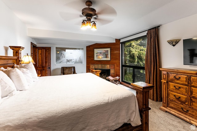 1485 Empire Ave Unit 511, Park City, UT 84060 - carpeted bedroom with vaulted ceiling, a ceiling fan, and a tile fireplace