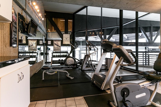 1485 Empire Ave Unit 511, Park City, UT 84060 - gym featuring light tile patterned flooring, plenty of natural light, and a wall of windows