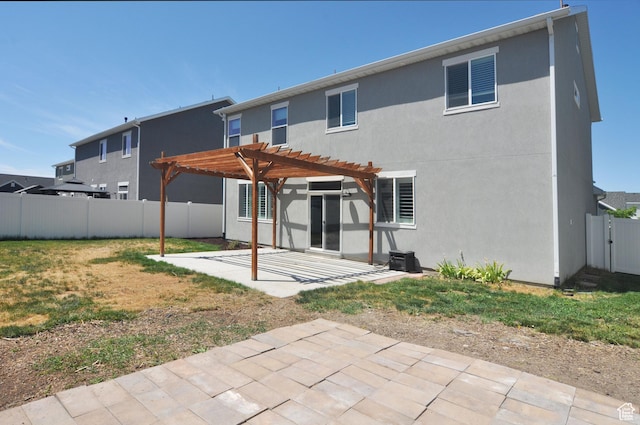 3639 S Clearwater Way, Syracuse, UT 84075 - back of property with a patio, a pergola, stucco siding, and a fenced backyard