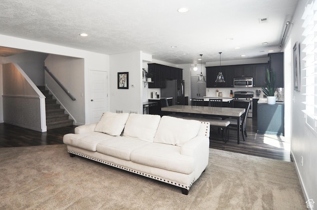 3639 S Clearwater Way, Syracuse, UT 84075 - living room featuring stairway, baseboards, dark wood-type flooring, and recessed lighting