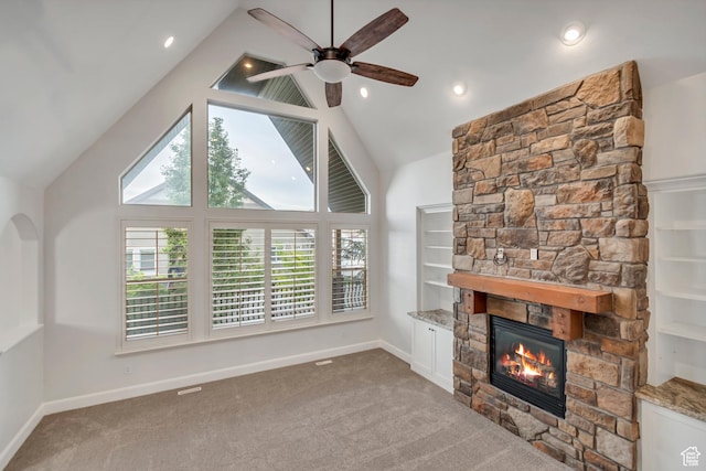 1498 W Mule Train Dr, Bluffdale, UT 84065 - unfurnished living room with a fireplace, carpet floors, a ceiling fan, baseboards, and high vaulted ceiling