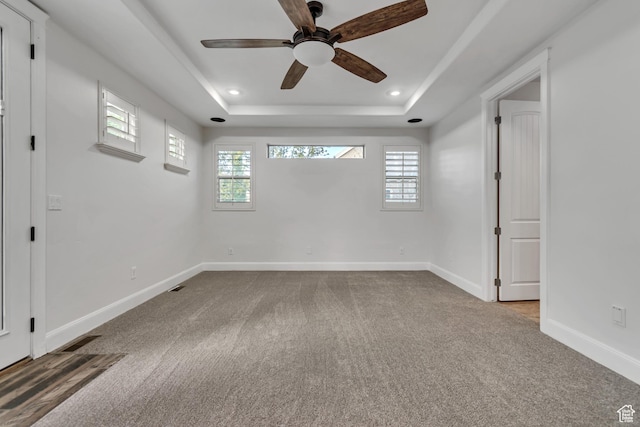 1498 W Mule Train Dr, Bluffdale, UT 84065 - carpeted spare room with ceiling fan, healthy amount of natural light, baseboards, a raised ceiling, and recessed lighting