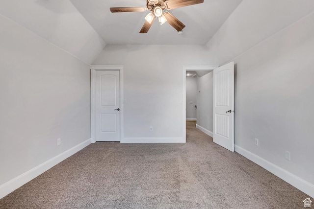 1498 W Mule Train Dr, Bluffdale, UT 84065 - unfurnished bedroom with carpet flooring, baseboards, ceiling fan, and lofted ceiling
