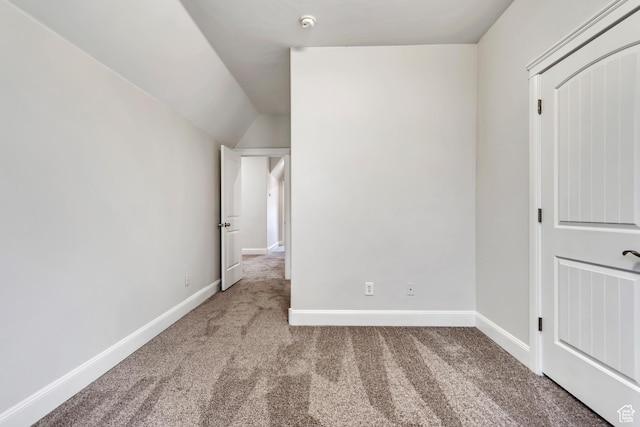 1498 W Mule Train Dr, Bluffdale, UT 84065 - unfurnished bedroom with carpet flooring, baseboards, and vaulted ceiling