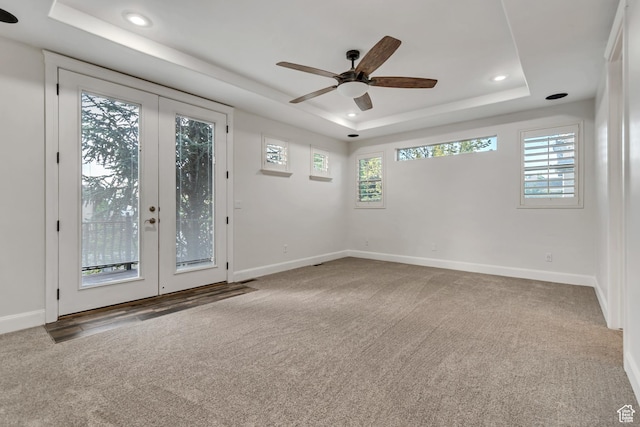 1498 W Mule Train Dr, Bluffdale, UT 84065 - empty room featuring french doors, carpet flooring, a raised ceiling, and recessed lighting