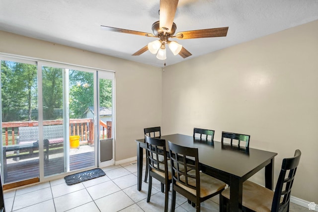 4070 W 2600 N, Corinne, UT 84307 - dining area featuring ceiling fan, baseboards, and light tile patterned flooring