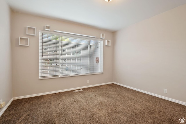 1047 E Eastgate Rd, Salt Lake City, UT 84117 - empty room with carpet and baseboards