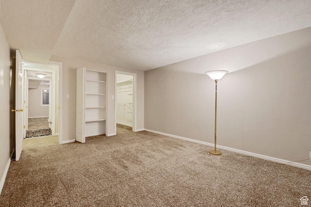 1047 E Eastgate Rd, Salt Lake City, UT 84117 - unfurnished bedroom with carpet flooring and a textured ceiling
