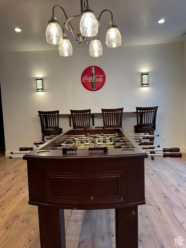 12612 S Starlite Hill Ln W, Herriman, UT 84096 - recreation room with baseboards, light wood-style flooring, recessed lighting, and a chandelier