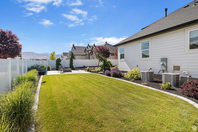 12612 S Starlite Hill Ln W, Herriman, UT 84096 - view of yard featuring central air condition unit and a patio area